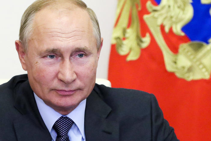 Russian President Vladimir Putin attends a meeting on economic issues via video conference Thursday at his Novo-Ogaryovo residence outside Moscow.