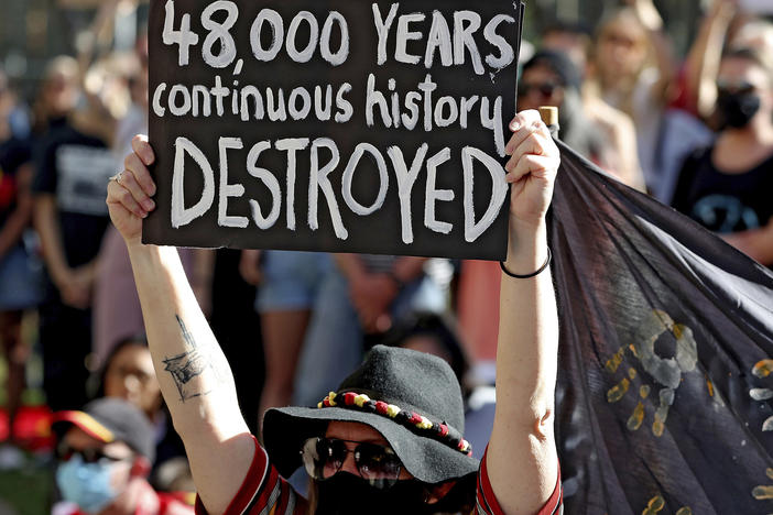 Protesters rallied outside the Rio Tinto office in June in Perth, Australia, after the destruction of Indigenous heritage sites the month before.
