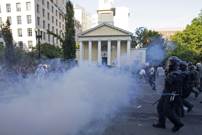 Police move in on demonstrators in Lafayette Square near the White House with tear gas and smoke on June 1. U.S. Park Police made announcements asking protesters to leave, but few people appeared to hear them.