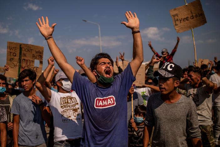 Refugees from the Moria camp protest near Mytilene on the Greek island of Lesbos on Saturday, a few days after a fire destroyed the refugee camp.