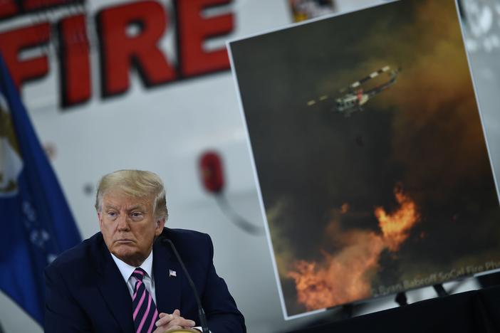 President Trump speaks Monday during a briefing on wildfires in McClellan Park, Calif.