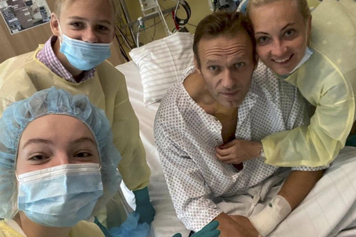 Russian opposition leader Alexei Navalny posted a photo of himself with daughter Daria, son Zahar and wife Yulia on his Instagram account Tuesday from his hospital bed in Berlin.