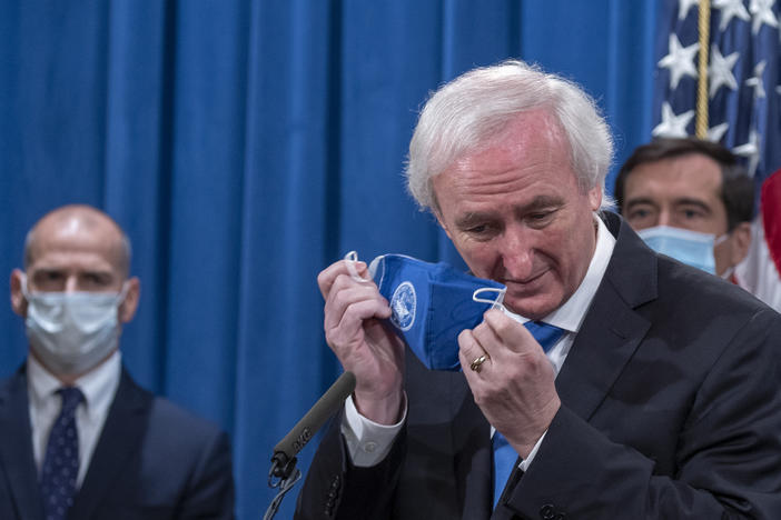 Deputy Attorney General Jeffrey Rosen announces the cybercrime allegations on Wednesday at the Justice Department.