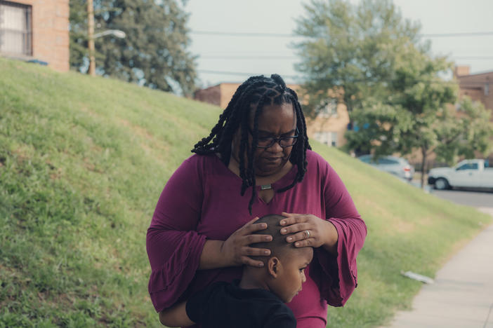 Patricia Stamper, with her 5-year-old son, works with children who have cognitive and physical disabilities at an elementary school in Washington, D.C.