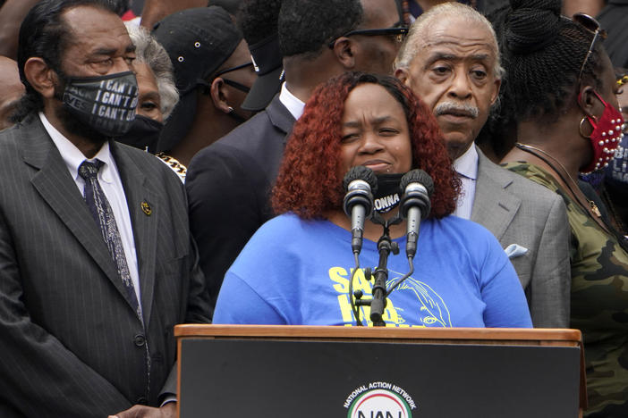 Tamika Palmer spoke at the March on Washington last month at the Lincoln Memorial in Washington, D.C. At left is Rep. Al Green, D-Texas, and at right is the Rev. Al Sharpton.