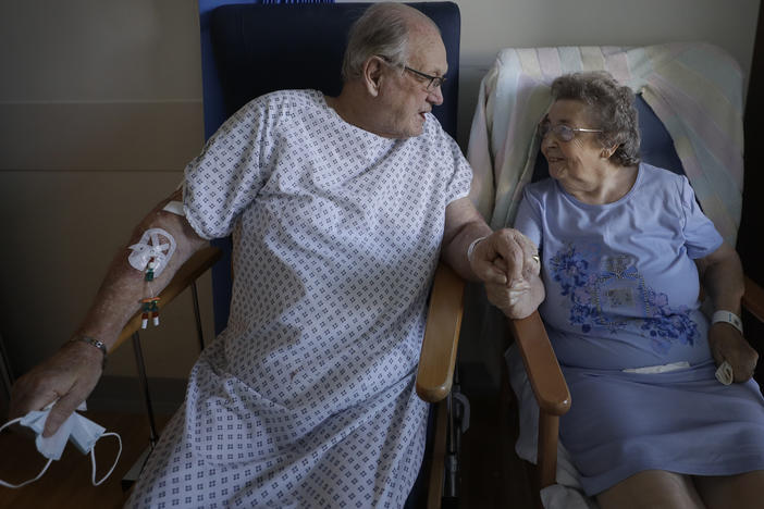 English coronavirus patients George Gilbert, 85, and his wife, Domneva Gilbert, 84, were part of a clinical trial that included Eli Lilly & Co.'s baricitinib.