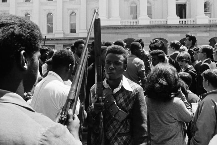 Armed members of the Black Panther Party leave the Capitol in Sacramento May 2, 1967. The Panthers entered the Capitol fully armed and said they were protesting a bill before the Legislature restricting the carrying of arms in public.
