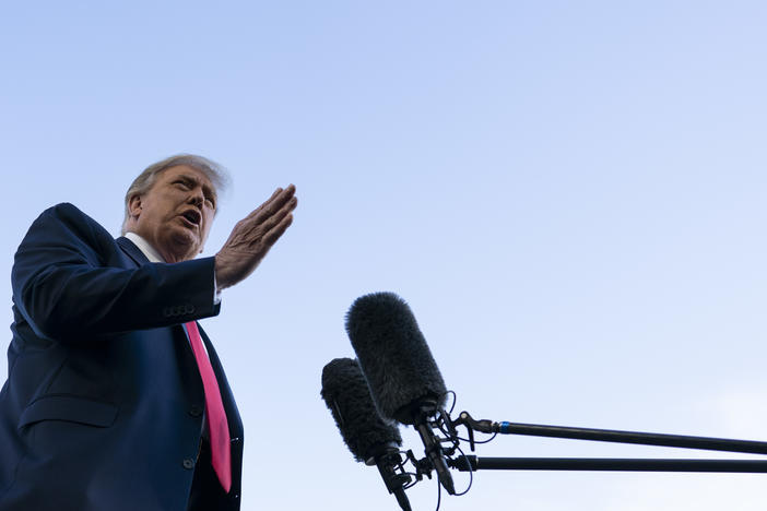 President Trump speaks with reporters on the South Lawn prior to departing the White House on Saturday.