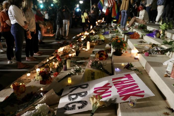 A crowd gathers at the U.S. Supreme Court to mourn the death of Supreme Court Justice Ruth Bader Ginsburg on Friday.