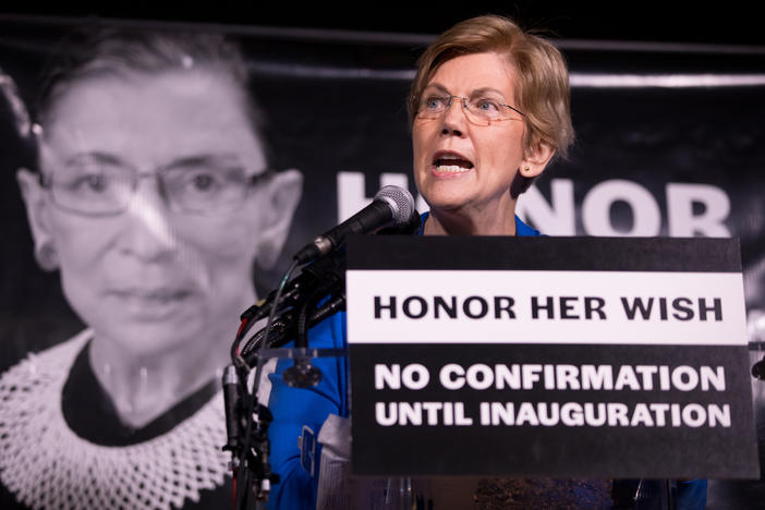 Sen. Elizabeth Warren, D-Mass., rallies the crowd of 2,500 people during a vigil Saturday night for Justice Ruth Bader Ginsburg in Washington, D.C.