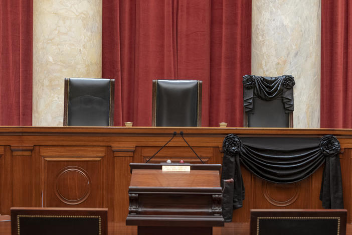 The bench draped for the death of Justice Ruth Bader Ginsburg.