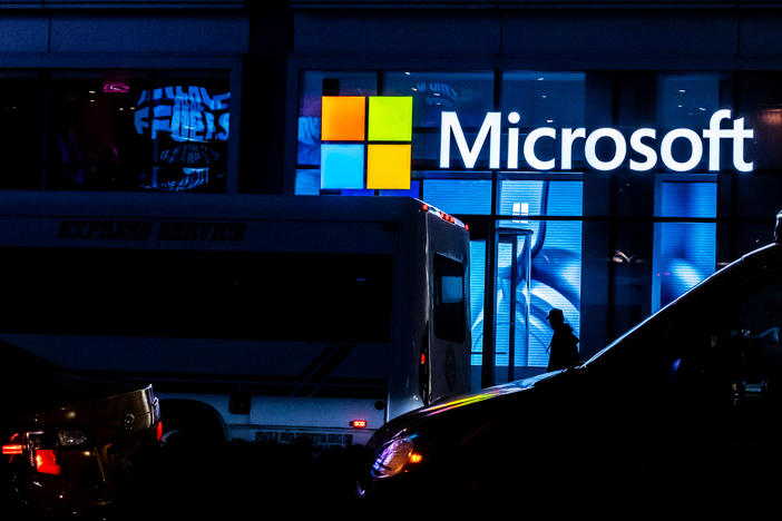 Microsoft announced Monday that it will acquire ZeniMax Media, the parent company of popular video game publisher Bethesda, for $7.5 billion. Here, a Microsoft store is shown in March in New York City.