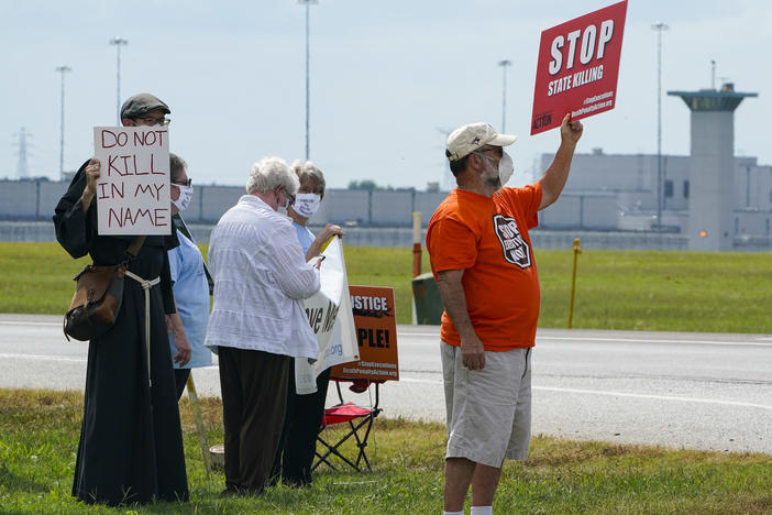 Demonstrators gathered across from the federal prison complex in Terre Haute, Ind., to protest the death penalty. Another execution is scheduled for Thursday.
