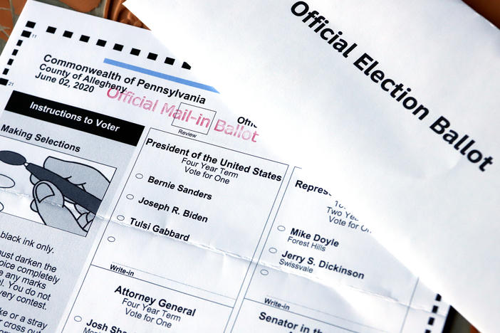 This May 26 photo shows an official Democratic primary mail-in ballot and secrecy envelope for the Pennsylvania primary in Pittsburgh.