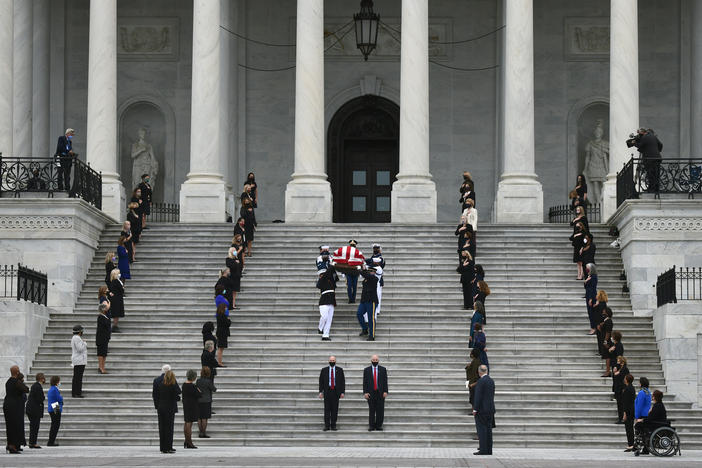 Justice Ruth Bader Ginsburg's casket leaves the U.S. Capitol.