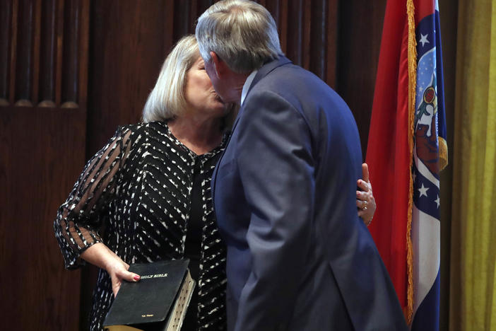 Gov. Mike Parson and his wife, Teresa, share a kiss after he was sworn in as Missouri's 57th governor in 2018.