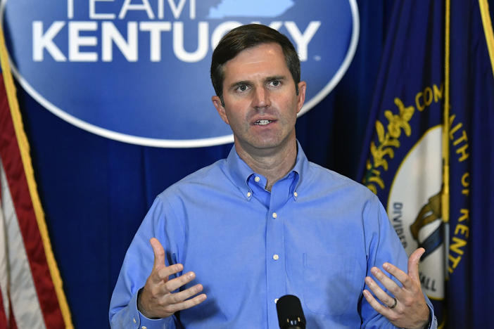 Kentucky Gov. Andy Beshear addresses the media following the return of a grand jury investigation into the death of Breonna Taylor in Frankfort, Ky., on Wednesday. Beshear has made a request to Kentucky Attorney General Daniel Cameron to release the grand jury transcripts to the public.