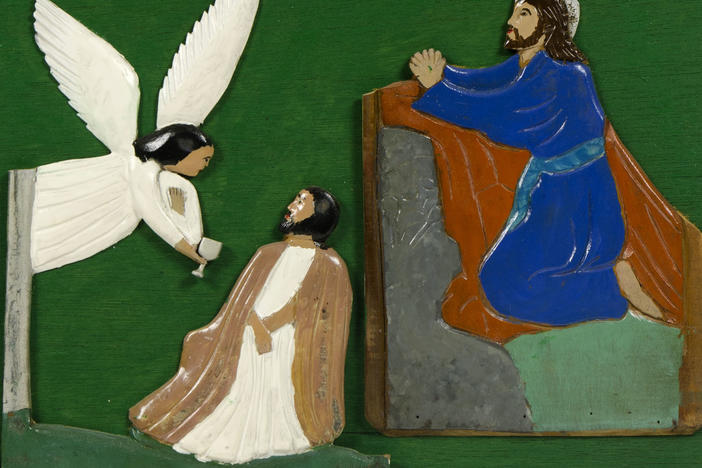 A page from <em>The Book of Wood: Rose of Sharon, Jesus Heals Woman Bleeding, Judas Kiss, Jesus in the Garden of Gethsemane,</em> 1932, paint on carved wood, mounted on wood panels
