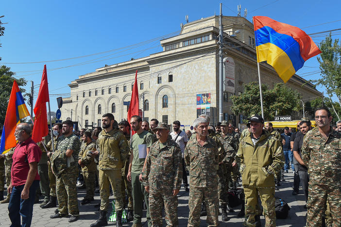 Servicemen and members of the Armenian Revolutionary Federation gather after the Armenian government declared martial law and military mobilization amidst growing conflict with Azerbaijan.