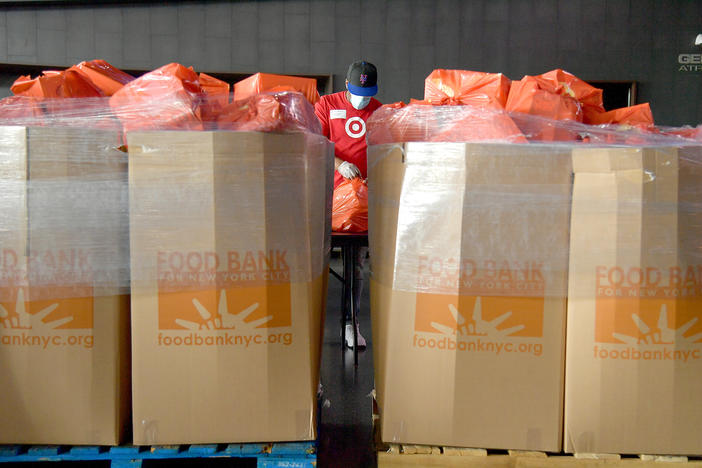 New Yorkers in need receive free produce, dry goods and meat at a Food Bank For New York City distribution event in July. Hunger is one of the most urgent — yet hidden — crises facing the nation.