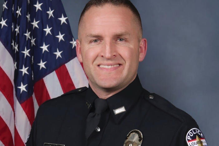 A Kentucky grand jury on Wednesday indicted former Louisville Police Department detective Brett Hanksion for shooting into neighboring apartments. On Monday he pleaded not guilty.