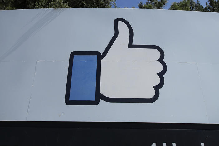 The thumbs up Like logo is shown on a sign at Facebook headquarters in Menlo Park, Calif.
