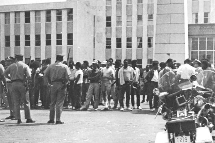 Protestors held a rally at a municipal building prior to the riot in Augusta, Ga., in 1970. Approximately 300 people attended and 25–30 police officers stood watch.