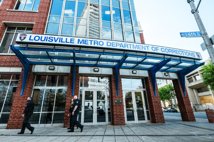 Kentucky's Jefferson County Circuit Court has released audio of the grand jury proceedings in the Breonna Taylor case. Here, police officers walk by the Louisville Metro Department of Corrections, which sits adjacent to Jefferson Square Park, the epicenter for Black Lives Matter protests over Taylor's death.