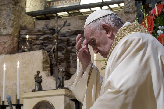 Pope Francis celebrates Mass in the crypt of the Basilica of St. Francis, in Assisi, Italy, on Oct. 3.