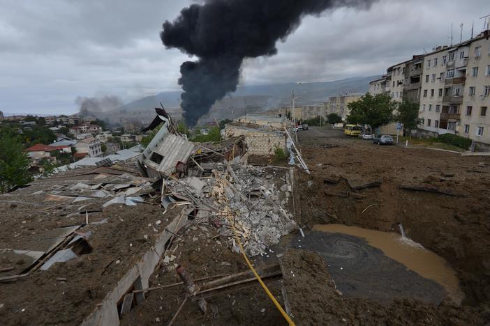 Smoke rises in the aftermath of recent shelling during the ongoing fighting between Armenia and Azerbaijan on Sunday.