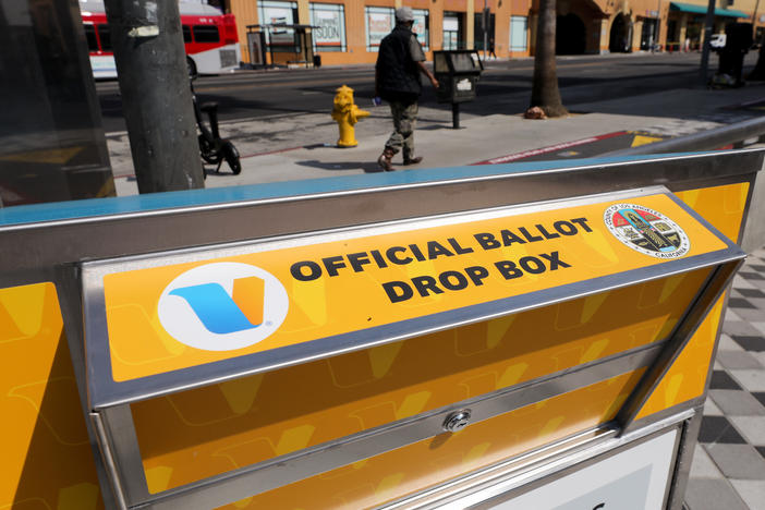 An official mail-in ballot drop box is posted in Los Angeles.