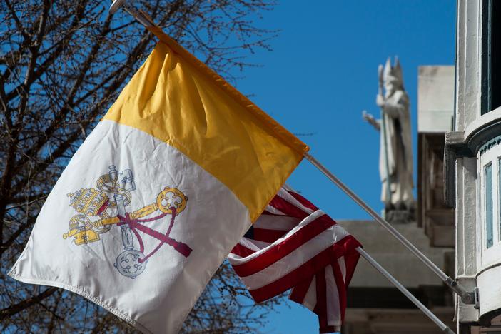 The U.S. flag and flag of Vatican City are hung on the outside of the Pennsylvania Catholic Conference building in Harrisburg, Pa., on March 26, 2019. Catholics outnumber Evangelicals in Pennsylvania by a 2-to-1 margin.