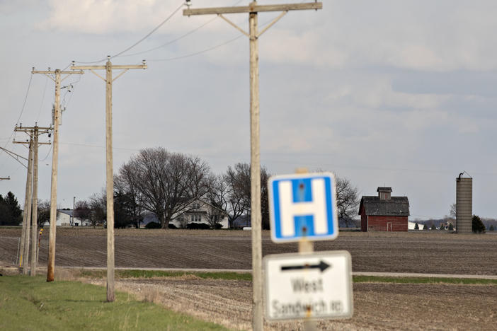 A road sign for a nearby hospital along a rural road outside Sandwich, Ill., in April.