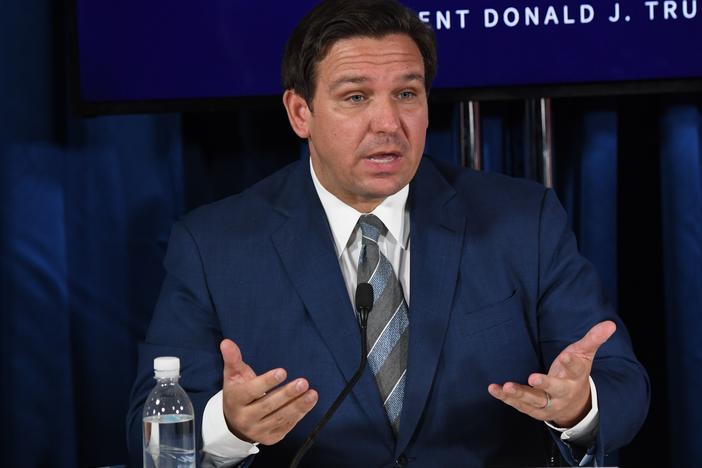 Florida Gov. Ron DeSantis, seen here in July, has extended the voter registration deadline by a day after the state's online portal crashed Monday.