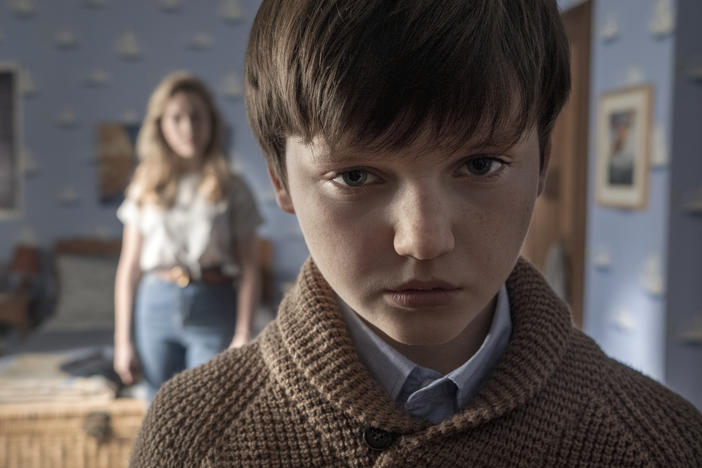 What's creepier: The kid (Benjamin Evan Ainsworth) or the high-waisted jeans on the au pair (Victoria Pedretti)? <em>The Haunting of Bly Manor</em> makes a case for both.