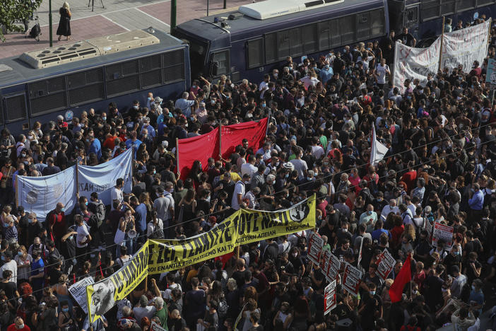 Thousands of people gather for an anti-fascist protest outside a court in Athens on Wednesday. The court ruled the neo-Nazi Golden Dawn party was operating as a criminal organization, and delivered landmark guilty verdicts in a five-year trial against dozens of defendants, including former lawmakers.