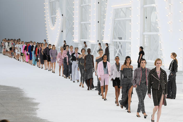 Models walk the runway during the Chanel Womenswear Spring/Summer 2021 show as part of Paris Fashion Week on Oct. 06, 2020.