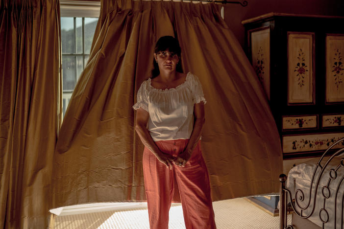 After making a new life in the U.S., Jacob Moscovitch's mother, or Imma, raised three kids and led the household while working a part-time job. Moscovitch says his older sister Simone told him, "Imma is my superhero, no cape necessary." Here, Imma stands for a portrait in her bedroom on May 8.
