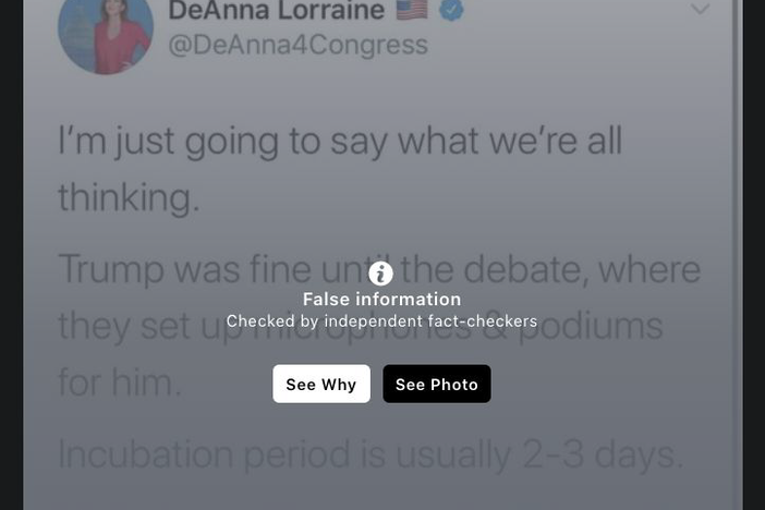 A screenshot of Facebook post about how President Trump came down with COVID-19 that was labeled "false information." At the bottom there is a link to a news article that fact-checks the false information in the social media post.