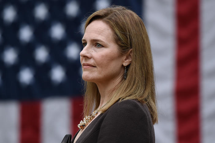 Judge Amy Coney Barrett, here at the White House on Sept. 26, is President Trump's Supreme Court nominee — and she has gun control groups worried.
