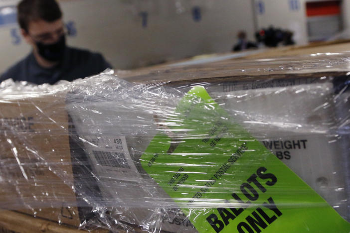 Blank absentee ballots are delivered to the U.S. Postal Service on Monday in Frankly County, Ohio. About 50,000 voters will receive replacement ballots after an error was found.