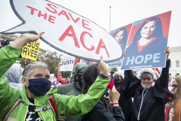 On the first day of Senate hearings over the confirmation of Judge Amy Coney Barrett to the Supreme Court, supporters and opponents of the confirmation confront each other in front of the Supreme Court.