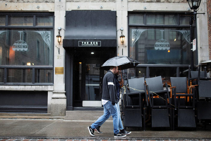 Chairs are stacked outside a restaurant in Montreal on Sept. 29. The Quebec government ordered restaurants, bars and casinos to close for 28 days, effective midnight Sept. 30, after a recent spike in new daily coronavirus cases.