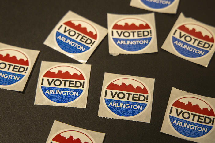 "I voted" stickers at the Arlington Art Center in Arlington, Va. Several prominent Virginians including Lt. Gov. Justin Fairfax are calling for an extension to the voter registration deadline.