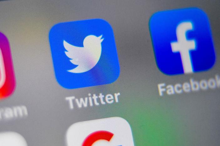Twitter and Facebook said their decisions to limit sharing of a <em>New York Post</em> article were meant to slow the spread of potentially false information.