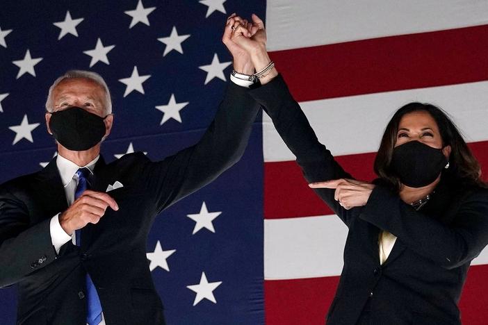 Former vice-president and Democratic presidential nominee Joe Biden and Senator from California and Democratic vice presidential nominee Kamala Harris greet supporters outside the Chase Center in Wilmington, Delaware.