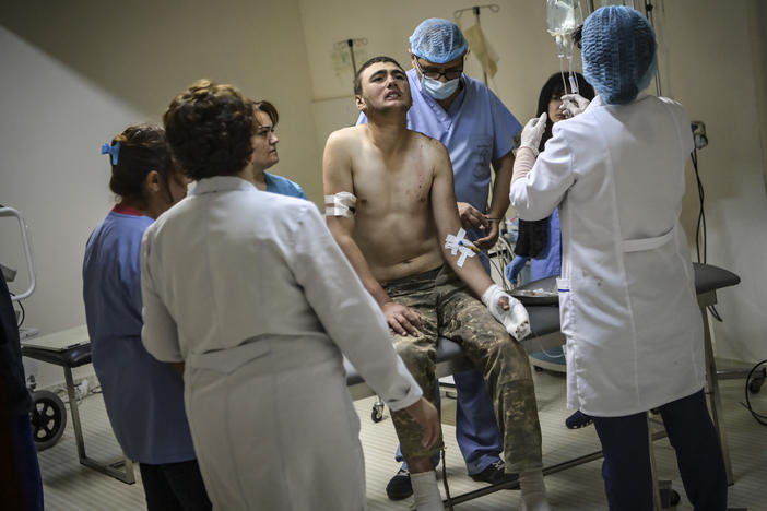 An wounded Armenian soldier getting treatment in the basement of a medical center on Wednesday outside the city of Stepanakert, in the Nagorno-Karabakh region.