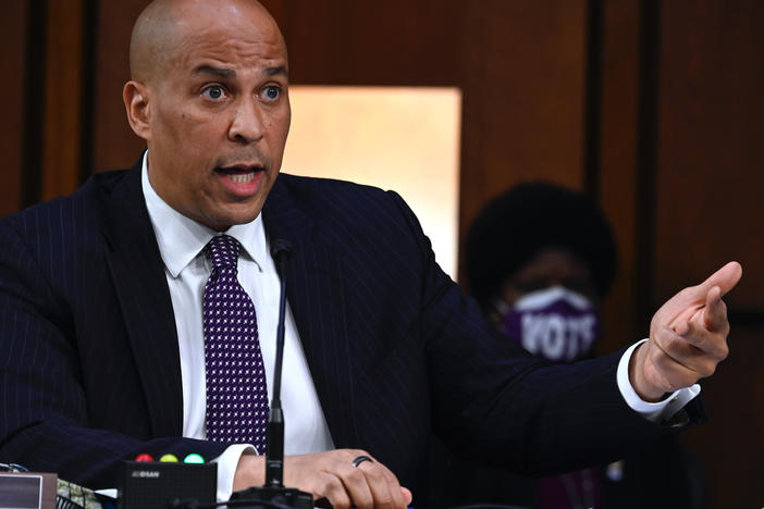 Sen. Cory Booker, D-N.J., questions Supreme Court nominee Judge Amy Coney Barrett as she testifies before the Senate Judiciary Committee on the third day of her confirmation hearing.  (Andrew Caballero-Reynolds-Pool/Getty Images)