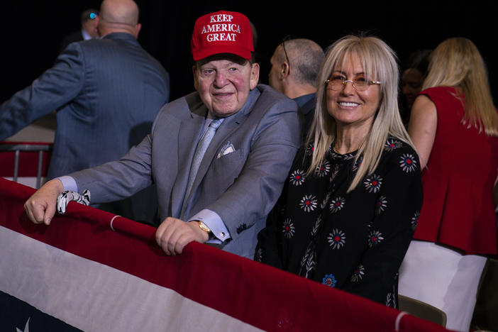 Republican megadonor Sheldon Adelson and his wife, Miriam, wait for the arrival of President Trump at a campaign rally at the Las Vegas Convention Center in February.