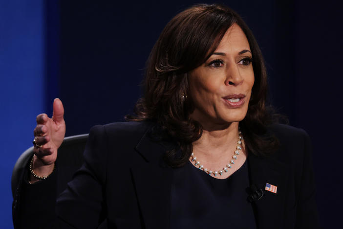 Democratic vice presidential nominee and California Sen. Kamala Harris, seen here during the Oct. 7 vice presidential debate, is postponing in-person campaign events after two people traveling with her tested positive for the coronavirus.